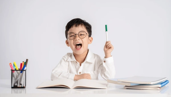 Asian kid reading